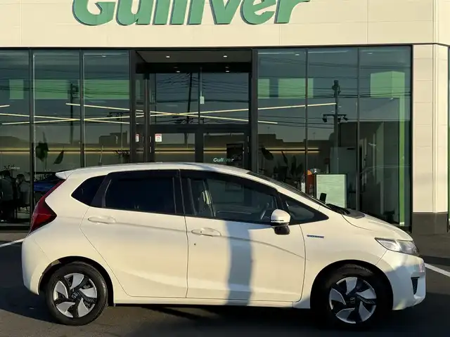 ホンダ フィット ハイブリット Fパッケージ 栃木県 2013(平25)年 9.5万km プレミアムホワイトパール 純正ナビ/バックカメラ/ステリモ/ETC/スマートキー×2