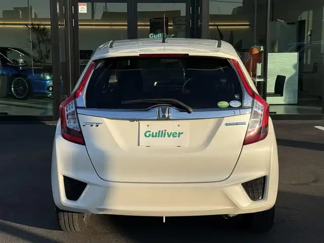 ホンダ フィット ハイブリット Fパッケージ 栃木県 2013(平25)年 9.5万km プレミアムホワイトパール 純正ナビ/バックカメラ/ステリモ/ETC/スマートキー×2