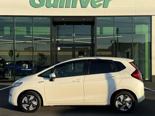 ホンダ フィット ハイブリット Fパッケージ 栃木県 2013(平25)年 9.5万km プレミアムホワイトパール 純正ナビ/バックカメラ/ステリモ/ETC/スマートキー×2