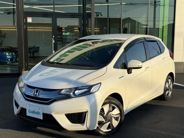 ホンダ フィット ハイブリット Fパッケージ 栃木県 2013(平25)年 9.5万km プレミアムホワイトパール 純正ナビ/バックカメラ/ステリモ/ETC/スマートキー×2