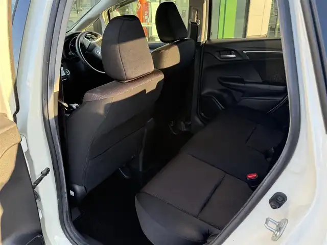 ホンダ フィット ハイブリット Fパッケージ 栃木県 2013(平25)年 9.5万km プレミアムホワイトパール 純正ナビ/バックカメラ/ステリモ/ETC/スマートキー×2