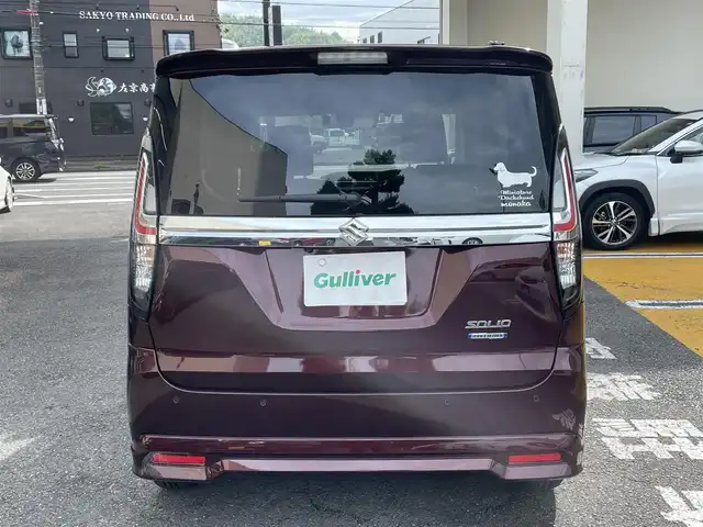 スズキ ソリオ HV MZ 静岡県 2024(令6)年 0.6万km メロウディープレッドパール 純正ナビ/フルセグTV/DVD/CD/BT/USB/全方位カメラ/両側電動スライドドア/衝突軽減ブレーキ/レーンキープアシスト/ヘッドアップディスプレイ/バックソナー/前後ドライブレコーダー/前席シートヒーター /LEDヘッドライト/LEDフォグライト/ビルトインETC/純正15インチAW/スマートキー×2/保証書/取扱説明書/ナビ取扱説明書