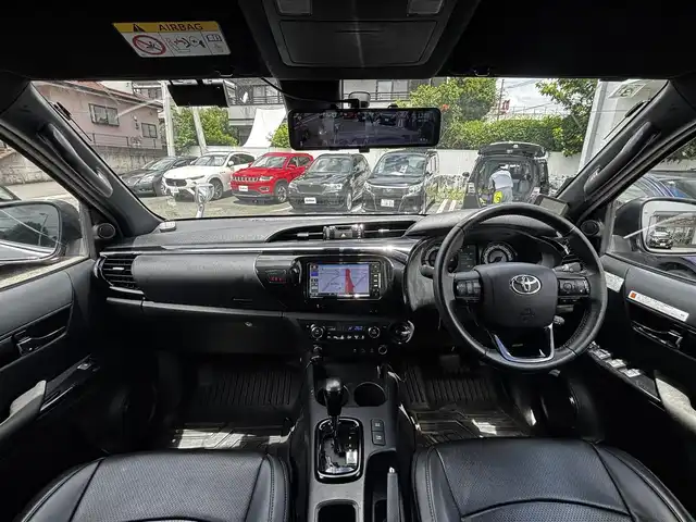 トヨタ ハイラックス Z ブラックラリーエディション 熊本県 2020(令2)年 7.7万km シルバーメタリック ワンオーナー/ハードトノカバー/社外SDナビ（CN-RE06WD）/【フルセグTV/CD/DVD/SD/BT】/バックカメラ/トヨタセーフティセンス/・プリクラッシュセーフティ/・レーンディパーチャアラート/・ロードサインアシスト/・先行車発進告知/レーダークルーズコントロール/ミラー一体型前後ドライブレコーダー/革調シートカバー/ステアリングリモコン/ダウンヒルアシスト/リアデフロック/オートライト/LEDヘッドライト/純正18インチAW/スマートキー/スペアキー/保証書/取扱説明書(車両/ナビ)