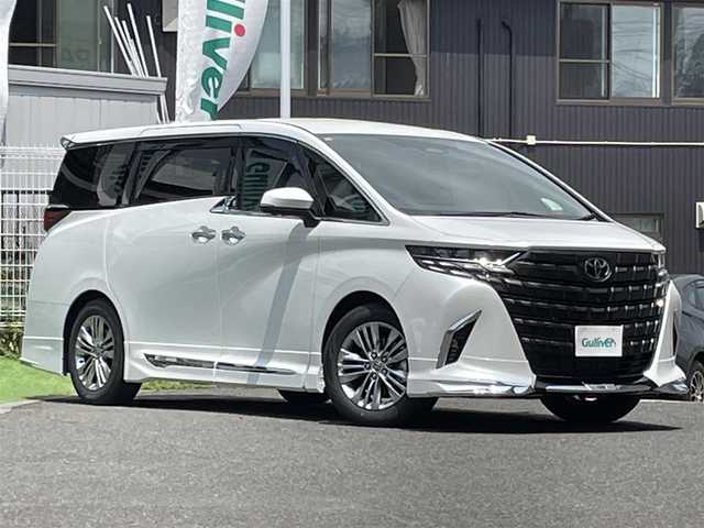 トヨタ アルファードハイブリット Z 宮城県 2025(令7)年 0.1万km未満 プラチナホワイトパールマイカ ワンオーナー/4WD/純正メモリーナビ/（ＦＭ／ＡＭ／Ｂｌｕｅｔｏｏｔｈ）　/フルセグテレビ　/左右独立ムーンルーフ　/モデリスタエアロ　/ＪＢＬサウンドシステム　/デジタルインナーミラー　/ユニバーサルステップ　/プリクラッシュセーフティー/レーダークルーズコントロール/レーンキープアシスト/両側パワースライドドア/横滑り防止装置/ブラインドスポットモニター/コーナーセンサー/パワーバックドア/純正フリップダウンモニター/置くだけ充電/全方位カメラ/バックカメラ/ベンチレーション/前後席シートヒーター/前後席パワーシート/シートメモリー/ステアリングヒーター/オートマチックハイビーム/オートライト/電動パーキングブレーキ/電動格納ミラー/スマートキー/プッシュスタート/ETC2.0