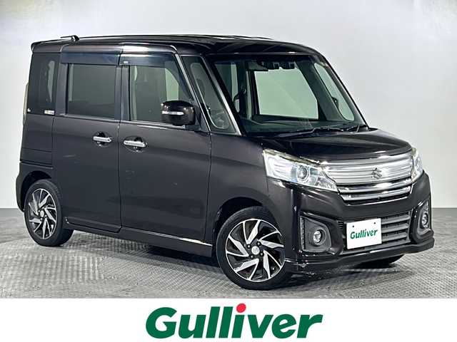 スズキ スペーシア カスタム XS 沖縄県 2016(平28)年 9.5万km アーバンブラウンパールメタリック 禁煙車/純正ディーラーナビ/【CD/フルセグTV/BT】/全方位カメラ/両側パワースライドドア/デュアルカメラブレーキサポート/レーンキープアシスト/横滑り防止装置/運転席シートヒーター/革調シートカバー/ステアリングリモコン/社外フロアマット/15インチ純正アルミ/フォグランプ