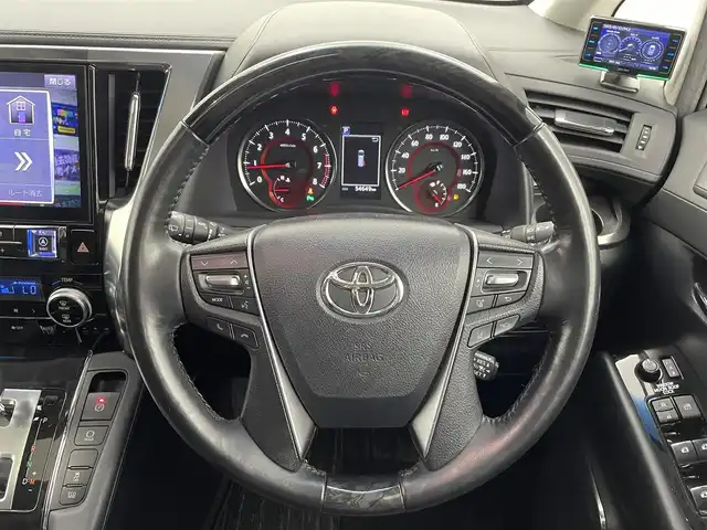 トヨタ アルファード S Cパッケージ 熊本県 2018(平30)年 5.5万km ホワイトパールクリスタルシャイン 社外11型ナビゲーション/社外12.8型後席フリップダウンモニター(PXH12X-R-AV)/Bluetooth/CD/DVD/純正前方ドライブレコーダー/バックカメラ/ビルトインETC/両側パワースライドドア/トヨタセーフティーセンス/・衝突軽減ブレーキ/・レーダークルーズコントロール/・先行車発進お知らせ/・車線逸脱警報機能/横滑り防止/電動リアゲート/前席パワーシート/前席シートヒーター/前席エアーシート/LEDヘッドライト/フォグランプ/モデリスタエアロ/オートライト/オートマチックハイビーム/LEDヘッドライト/フォグライト/スマートキー/プッシュスタート/スペアキー1本/保証書/取扱説明書