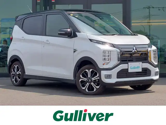 三菱 ｅＫクロス ＥＶ P 東京都 2023(令5)年 0.3万km アメジストブラック/シルキーホワイト 純正9インチナビ/ビルトインETC2.0/シートヒーター/ステアリングヒーター/LEDヘッドライト/オートライト/e-Assist/衝突被害軽減ブレーキシステム/車線逸脱警報システム/踏み間違い衝突防止アシスト/オートマチックハイビーム/パーキングセンサー/スマートキー/純正15インチAW