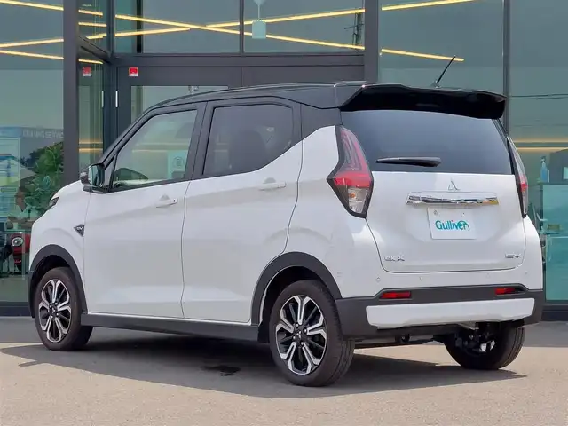 三菱 ｅＫクロス ＥＶ P 東京都 2023(令5)年 0.3万km アメジストブラック/シルキーホワイト 純正9インチナビ/ビルトインETC2.0/シートヒーター/ステアリングヒーター/LEDヘッドライト/オートライト/e-Assist/衝突被害軽減ブレーキシステム/車線逸脱警報システム/踏み間違い衝突防止アシスト/オートマチックハイビーム/パーキングセンサー/スマートキー/純正15インチAW