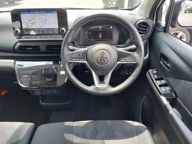 三菱 ｅＫクロス ＥＶ P 東京都 2023(令5)年 0.3万km アメジストブラック/シルキーホワイト 純正9インチナビ/ビルトインETC2.0/シートヒーター/ステアリングヒーター/LEDヘッドライト/オートライト/e-Assist/衝突被害軽減ブレーキシステム/車線逸脱警報システム/踏み間違い衝突防止アシスト/オートマチックハイビーム/パーキングセンサー/スマートキー/純正15インチAW
