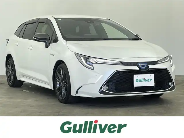 トヨタ カローラツーリング ハイブリッド ダブルバイビー 千葉県 2020(令2)年 6.9万km ホワイトパールクリスタルシャイン トヨタセーフティセンス/・プリクラッシュセーフティ/・プリクラッシュセーフティブレーキ/・レーダークルーズコントロール/・クリアランスソナー/・ブラインドスポットモニター/・レーンキープアシスト/純正８型ディスプレイオーディオ（ナビ付き）/・CD/DVD/USB/Bluetooth/フルセグTV/・バックカメラ/・ビルトインETC/革巻きステアリング/・ステアリングスイッチ/・ステアリングヒーター/ハーフレザーシート/・DNシートヒーター/電子パーキング/・ブレーキホールド/純正フロアマット/純正１７インチAW/オートライト/・オートマチックハイビーム/・LEDヘッドライト/・LEDフォグランプ