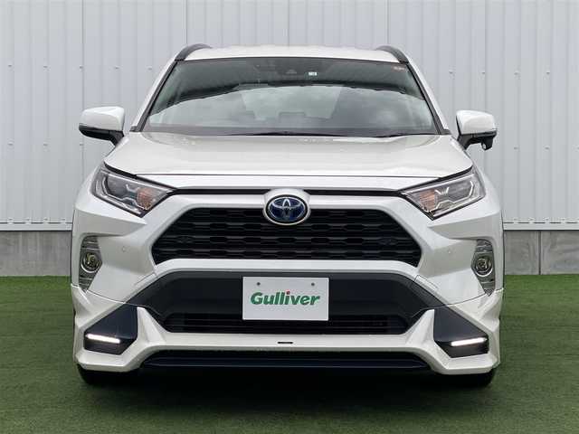 トヨタ ＲＡＶ４ ハイブリットX 香川県 2020(令2)年 6.7万km ホワイトパールクリスタルシャイン 登録時走行距離：66979km/アルパイン9型ナビ/バックカメラ/TRDフロントエアロ/プリクラッシュセーフティシステム/レーンキープアシスト/レーダークルーズコントロール/クリアランスソナー/オートハイビーム/LEDヘッドライト/オートライト/フォグランプ/MTモード付AT/オートホールド機能付き電子パーキングブレーキ/純正フロアマット/電動格納ウィンカーミラー/ラゲッジマット/プッシュスタート/スマートキー