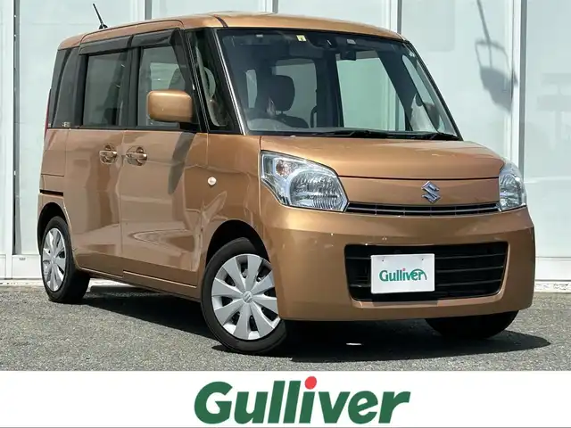 スズキ スペーシア X 福岡県 2014(平26)年 8.6万km キャンドルオレンジメタリック ・ナビ/（BLUETOOTH/フルセグ/バックカメラ/DVD再生機能/・スペアキー/・衝突軽減システム/・アイドリングストップ/・片側パワースライドドア/・電動格納ミラー/・CDチェンジャー/・ドアバイザー/・スマートキー/・ベンチシート/・保証書/・取扱説明書
