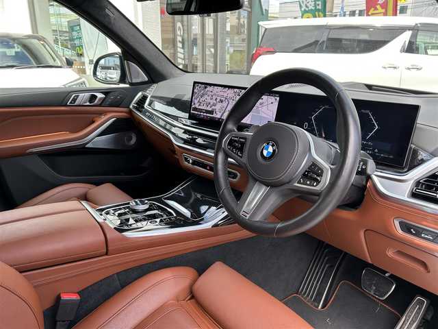 ＢＭＷ ＢＭＷ Ｘ７ xDrive40d Mスポーツ 福岡県 2023(令5)年 2.3万km カーボンブラックM ワンオーナー/純正ナビ（AM/FM/BT/ワンセグTV/AppleCarPlay)/ツインサンルーフ/ヘッドアップディスプレイ/前席メモリーシート/全席パワーシート/全席シートヒーター/前席エアシート/アラウンドビューモニター/ステアリングヒーター/クリアランスソナー/ドライブレコーダー/Bowers & Wilkinsサウンド/パワーバックドア/LEDライト/本革巻ステアリング/USB入力端子/純正23インチアルミホイール/スペアキー×１/保証書/取扱説明書