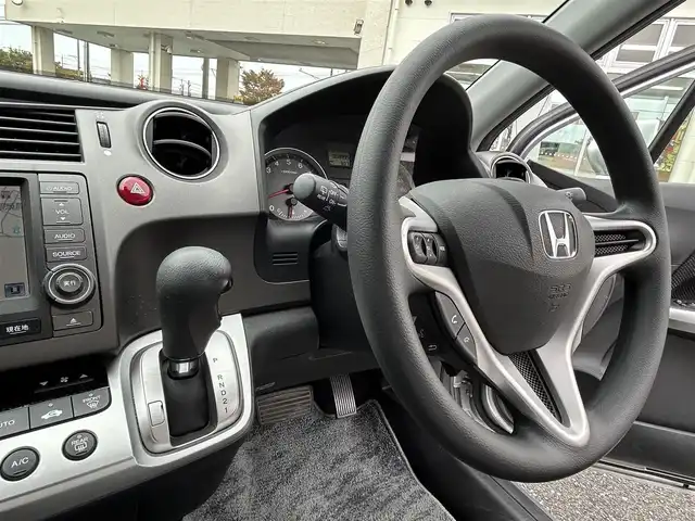 ホンダ ストリーム ZS HDDナビパッケージ 三重県 2009(平21)年 5.9万km スーパープラチナメタリック 登録時58935km/純正ナビ/ＦＭ／ＡＭ／ＨＤＤ／ＤＶＤ／ワンセグＴＶ/バックカメラ/ＥＴＣ/禁煙車/ハンズフリー/電格ミラー/３列シート/シートアレンジ/盗難防止装置/ドアバイザー/スペアキー１本