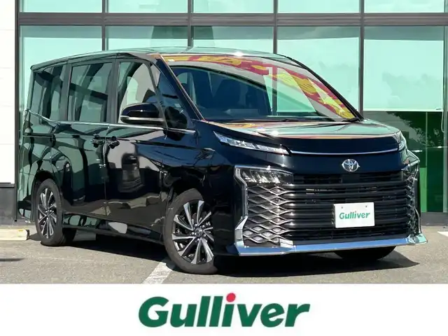 トヨタ ヴォクシー S－Z 和歌山県 2022(令4)年 6万km アティチュードブラックマイカ 純正コネクティッドナビ/フルセグTV/Bluetooth/CD/DVD/USB/HDMI/バックカメラ/純正フリップダウンモニター/ビルトインETC2.0/前後ドライブレコーダー/トヨタセーフティセンス/レーダークルーズコントロール/クリアランスソナー/レーンキープアシスト/両側パワースライドドア/革巻きステアリング/ステアリングスイッチ/LEDヘッドライト/オートライト/オートハイビーム/ヘッドライトレベライザー/ハーフレザーシート/前席シートヒーター/純正17インチAW/プッシュスタート/スマートキー/スペアキー