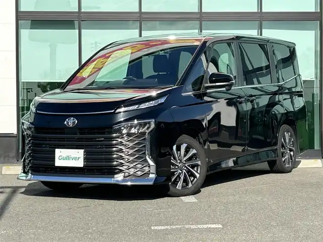 トヨタ ヴォクシー S－Z 和歌山県 2022(令4)年 6万km アティチュードブラックマイカ 純正コネクティッドナビ/フルセグTV/Bluetooth/CD/DVD/USB/HDMI/バックカメラ/純正フリップダウンモニター/ビルトインETC2.0/前後ドライブレコーダー/トヨタセーフティセンス/レーダークルーズコントロール/クリアランスソナー/レーンキープアシスト/両側パワースライドドア/革巻きステアリング/ステアリングスイッチ/LEDヘッドライト/オートライト/オートハイビーム/ヘッドライトレベライザー/ハーフレザーシート/前席シートヒーター/純正17インチAW/プッシュスタート/スマートキー/スペアキー