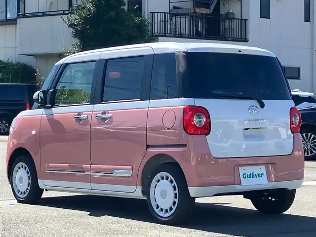 ダイハツ ムーヴ キャンバス ストライプス G 静岡県 2024(令6)年 0.1千km シャイニングホワイトパール/アプリコットピンクメタリック 純正ナビ(CD/DVD/BT/フルセグ)/バックカメラ/登録済未使用車/エンジンスタートボタン/保証書/取扱説明書/パワーステアリング/パワーウィンドウ/アイドリングストップ/オートエアコン/スペアキー１本/USB入力端子/D席N席シートヒーター/両側パワースライドドア/ABS/横滑り防止装置/コーナーセンサー前後/レーンキープアシスト/盗難防止装置/オートライト/オートマチックハイビーム/LEDヘッドライト/W+サイドエアバック/カーテンエアバック/衝突軽減システム/カップヒーター