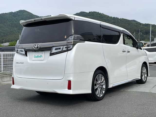 トヨタ ヴェルファイア Z ゴールデンアイズ 山梨県 2021(令3)年 4.6万km ホワイトパールクリスタルシャイン 純正ナビ/ビルトインETC /バックモニター/後席フリップダウンモニター/両側パワースライドドア/セーフティセンス/インテリジェントクリアランスソナー /レーンキープアシスト/オートマチックハイビーム/クルーズコントロール/プッシュスタート/パワーウインドウ/電動格納ミラー/純正フロアマット/純正アルミホイール/LEDヘッドライト