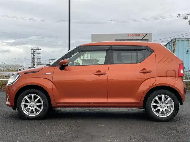 スズキ イグニス ハイブリッド MX 道央・札幌 2016(平28)年 6.8万km フレイムオレンジPM 4WD/ディーラーナビ/ＣＤ／ＤＶＤ／ＢＴ／フルセグ/バックカメラ/横滑り防止装置/盗難防止装置/シート‐ヒーター/純正フロアマット/スマートキー/スペアキー/エンジンスターター/ダウンヒルアシスト/ワンオーナー/ドアバイザー/アイドリングストップ