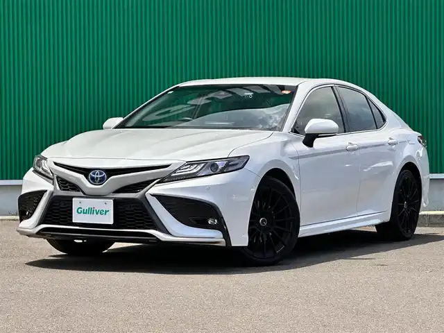 トヨタ カムリ WS 宮城県 2021(令3)年 3.6万km プラチナホワイトパールマイカ セーフティセンス/・プリクラッシュセーフティ/・レーダークルーズコントロール/・レーントレーシングアシスト/・オートマチックハイビーム/・ドライバー異常時対応システム/・ロードサインアシスト/・先行車発進告知機能/ブラインドスポットモニター/リアクロストラフィックオートブレーキ/インテリジェントクリアランスソナー/9インチディスプレイオーディオ/・CD/DVD/・AppleCarPlay/・USB/バックカメラ/ビルトインETC2.0/ドライブレコーダー/ハーフレザーシート/運転席パワーシート/革巻きステアリング/ステアリングスイッチ/パドルシフト/電動パーキングブレーキ/ブレーキホールド/LEDヘッドランプ/フォグランプ/オートライト/スマートキー＆プッシュスタート/電動格納ミラー/ENKEI19インチAW/純正フロアマット/W/サイド/カーテンエアバッグ