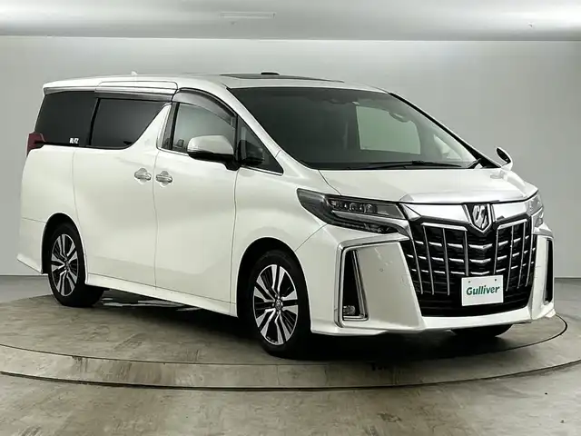 トヨタ アルファード S Cパッケージ 愛知県 2020(令2)年 6.2万km ホワイトパールクリスタルシャイン 純正9インチディスプレイオーディオ/・ナビ/・DVD/CD/・Bluetooth/・フルセグTV/・バックカメラ/・８スピーカー/純正フリップダウンモニター/ツインムーンルーフ/ビルトインETC/トヨタセーフティセンス/・プリクラッシュセーフティー/・レーダークルーズコントロール/・レーントレーシングアシスト/・アダプティブハイビーム/アクセサリーコンセント（AV100V）/ブラック合皮シート/・快適温熱シート/・前席パワーシート/・助手席パワーオットマン/・２列目エグゼクティブパワーシート/LEDヘッドランプ/純正１８インチアルミホイール/自動防眩ミラー/サンシェード