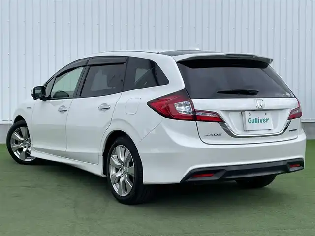 ホンダ ジェイド ハイブリッド X 香川県 2015(平27)年 3.3万km ホワイトオーキッドパール ホンダセンシング/→衝突軽減ブレーキ/→誤発進抑制機能/→路外逸脱抑制機能/→アダプティブクルーズコントロール/→車線維持支援システム/→先行車発進お知らせ機能/純正メモリナビ/【フルセグTV/CD/DVD/バックカメラ】/両側パワースライドドア/ハーフレザーシート/純正17インチアルミホイール/純正フロアマット/ステアリングリモコン/革巻きステアリング/ETC/ドライブレコーダー/HDML接続端子/オートライト/LEDヘッドライト/プッシュスタート/スマートキー