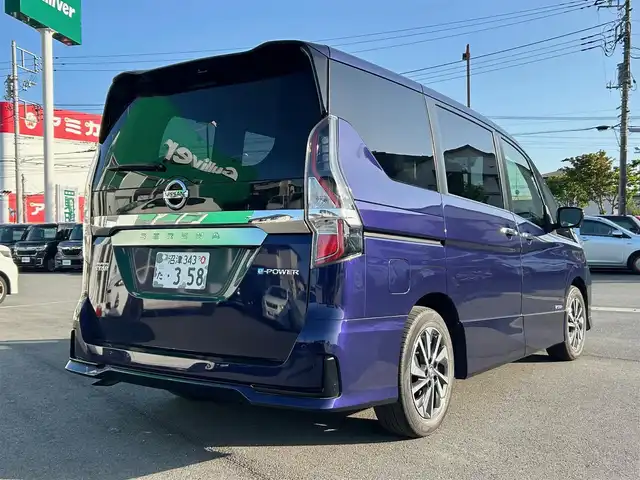 日産 セレナ e－パワー ハイウェイスター V 静岡県 2021(令3)年 2.7万km アズライトブルー エンジンスタートボタン/パワーウィンドウ/パワーステアリング/スマートキー/WAC/クルーズコントロール（追従走行有）/後席用モニター/USB入力端子/純正ETC/全方位カメラ/SDナビ（フルセグTV、BT接続、CDチェンジャー）/三列シート/ウォークスルー/純正フロアマット/布系シート/両側パワースライドドア/純正アルミホイール/ABS/横滑り防止装置/オートライト/オートマチックハイビーム/前後コーナーセンサー/LEDヘッドライト/W+サイドエアバック/衝突軽減システム/プロパイロット付き