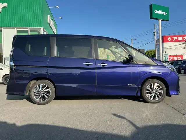 日産 セレナ e－パワー ハイウェイスター V 静岡県 2021(令3)年 2.7万km アズライトブルー エンジンスタートボタン/パワーウィンドウ/パワーステアリング/スマートキー/WAC/クルーズコントロール（追従走行有）/後席用モニター/USB入力端子/純正ETC/全方位カメラ/SDナビ（フルセグTV、BT接続、CDチェンジャー）/三列シート/ウォークスルー/純正フロアマット/布系シート/両側パワースライドドア/純正アルミホイール/ABS/横滑り防止装置/オートライト/オートマチックハイビーム/前後コーナーセンサー/LEDヘッドライト/W+サイドエアバック/衝突軽減システム/プロパイロット付き