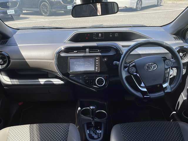 トヨタ アクア クロスオーバー グラム 新潟県 2019(平31)年 1.8万km ベージュ ワンオーナー/夏タイヤ積載/純正SDナビ/（TV/DVD/Bluetooth）/衝突軽減/パーキングサポートブレーキ/クリアランスソナー/先行車発進検知/車線逸脱警報/バックカメラ/ハーフレザー/ステアリングスイッチ/シガーソケット/フロアマット/ヘッドライトレベライザー/ウィンカーミラー/電格ミラー/ドアバイザー/スペアキー×１