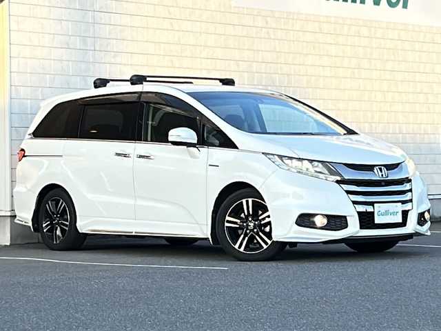 ホンダ オデッセイ ハイブリッド アブソルートセンシングEXパック 茨城県 2016(平28)年 7.6万km ホワイトオーキッドパール 純正HONDAインターナビ/(地デジTV・CD・DVD・BT・USB・ラジオ再生)/両側パワースライドドア/後席フリップダウンモニター/クルーズコントロール/衝突軽減ブレーキ/ブラインドスポットモニター/ハーフレザーシート/アラウンドビューカメラ/ETC/オートライト/LEDヘッドライト/純正17inアルミホイール/フロアマット/スマートキー