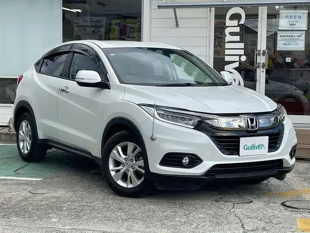 ホンダ ヴェゼル X ホンダセンシング 神奈川県 2018(平30)年 0.4万km プラチナホワイトパール ワンオーナー/純正メモリナビ/　（CD・DVD・Bluetooth）/フルセグTV/ホンダセンシング/アダプティブクルーズコントロール/LEDヘッドライト/ビルトインETC/バックカメラ/スマートキー×2/純正16インチAW/保証書/取扱説明書
