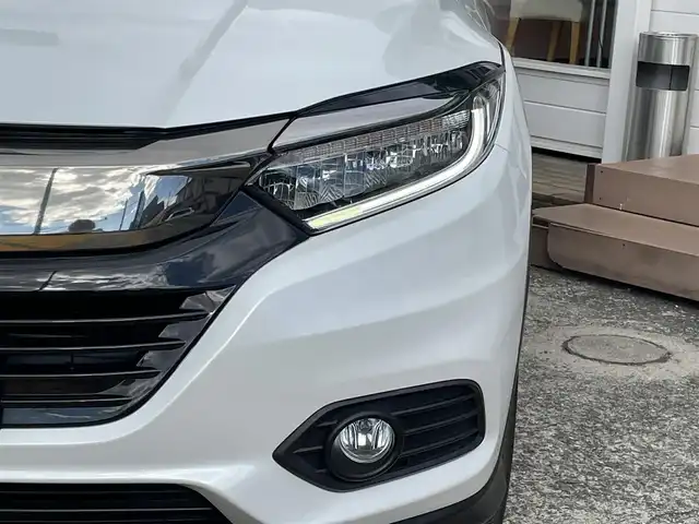 ホンダ ヴェゼル X ホンダセンシング 神奈川県 2018(平30)年 0.4万km プラチナホワイトパール ワンオーナー/純正メモリナビ/　（CD・DVD・Bluetooth）/フルセグTV/ホンダセンシング/アダプティブクルーズコントロール/LEDヘッドライト/ビルトインETC/バックカメラ/スマートキー×2/純正16インチAW/保証書/取扱説明書