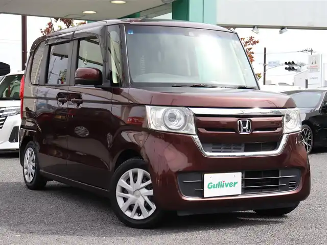 ホンダ Ｎ ＢＯＸ G L ターボ ホンダセンシング 神奈川県 2017(平29)年 3.9万km プレミアムアガットブラウンP ターボ/ホンダセンシング（安全支援システム）/：衝突軽減ブレーキ/：誤発進抑制機能/：後方誤発進抑制機能/：歩行車事故低減ステアリング/：先行車発進お知らせ機能/：アダプティブクルーズコントロール/：車線維持支援システム/：オートハイビーム/：標識認識機能/：路外逸脱抑制機能/両側パワースライドドア /LEDヘッドランプ/：オートヘッドライト/ビルトインETC/HONDA純正8インチプレミアムインターナビ/：フルセグTV/：CD DVD再生/：Bluetoothオーディオ/：バックカメラ/ロールサンシェード（後席左右）/シートリフター（運転席）/：シートバックポケット/純正フロアマット/：ドアバイザー/スマホ充電/ーーーーーーーーーーーーーーーーーーーーーーー/保証書/取扱説明書/ナビ取説/スペアスマートキー×1本