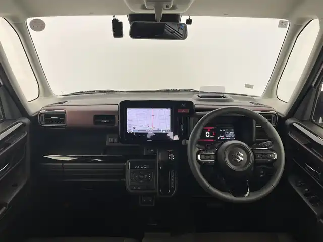 スズキ スペーシア カスタム HYBRID XS 富山県 2025(令7)年 0.8万km ピュアホワイトパール/ブラック2トーン 純正ナビ（AM/FM/BT/USB/フルセグ）/全方位カメラ/ドライブレコーダー/ETC/両側パワースライドドア/ハーフレザーシート/シートヒーター/ハンドルヒーター/衝突被害軽減システム/レーダークルーズコントロール/レーンキープアシスト/コーナーセンサー/横滑り防止装置/ヘッドアップディスプレイ/オートホールド付電子パーキング/純正アルミホイール/純正フロアマット/ハンドルヒーター/革巻きステアリング/ステアリングスイッチ/オートLEDライト/フォグライト/スマートキー