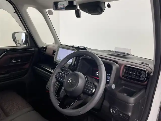 スズキ スペーシア カスタム HYBRID XS 富山県 2025(令7)年 0.8万km ピュアホワイトパール/ブラック2トーン 純正ナビ（AM/FM/BT/USB/フルセグ）/全方位カメラ/ドライブレコーダー/ETC/両側パワースライドドア/ハーフレザーシート/シートヒーター/ハンドルヒーター/衝突被害軽減システム/レーダークルーズコントロール/レーンキープアシスト/コーナーセンサー/横滑り防止装置/ヘッドアップディスプレイ/オートホールド付電子パーキング/純正アルミホイール/純正フロアマット/ハンドルヒーター/革巻きステアリング/ステアリングスイッチ/オートLEDライト/フォグライト/スマートキー