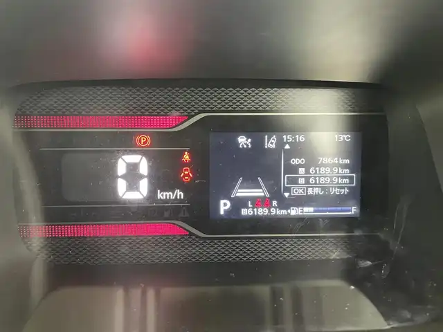 スズキ スペーシア カスタム HYBRID XS 富山県 2025(令7)年 0.8万km ピュアホワイトパール/ブラック2トーン 純正ナビ（AM/FM/BT/USB/フルセグ）/全方位カメラ/ドライブレコーダー/ETC/両側パワースライドドア/ハーフレザーシート/シートヒーター/ハンドルヒーター/衝突被害軽減システム/レーダークルーズコントロール/レーンキープアシスト/コーナーセンサー/横滑り防止装置/ヘッドアップディスプレイ/オートホールド付電子パーキング/純正アルミホイール/純正フロアマット/ハンドルヒーター/革巻きステアリング/ステアリングスイッチ/オートLEDライト/フォグライト/スマートキー