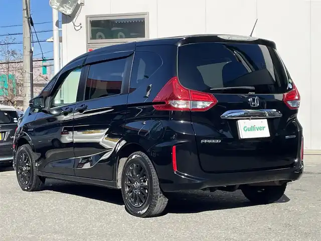 ホンダ フリード ハイブリット G ホンダセンシング 宮城県 2018(平30)年 4.5万km プレミアムスパークルブラックパール ４ＷＤ　/両側パワースライドドア　/3列シート６人乗り　/ワンオーナー（保証書・取扱説明書）/フィリップダウンモニター　ALPINE/社外ナビ/　CD/DVD　フルセグテレビ　Bluetooth　FM/AM/前後ドラレコ　/ＥＴＣ　/ホンダセンシング　/　コーナーセンサー　追突軽減システム　レーンアシスト　/　横滑り防止/プッシュスタート/スペアキー　　エンジンスタータ/シートヒーター/ウォークスルー/社外フロアマット/オートライト/純正スチールホイールサマータイヤ積載
