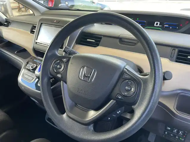 ホンダ フリード ハイブリット G ホンダセンシング 宮城県 2018(平30)年 4.5万km プレミアムスパークルブラックパール ４ＷＤ　/両側パワースライドドア　/3列シート６人乗り　/ワンオーナー（保証書・取扱説明書）/フィリップダウンモニター　ALPINE/社外ナビ/　CD/DVD　フルセグテレビ　Bluetooth　FM/AM/前後ドラレコ　/ＥＴＣ　/ホンダセンシング　/　コーナーセンサー　追突軽減システム　レーンアシスト　/　横滑り防止/プッシュスタート/スペアキー　　エンジンスタータ/シートヒーター/ウォークスルー/社外フロアマット/オートライト/純正スチールホイールサマータイヤ積載