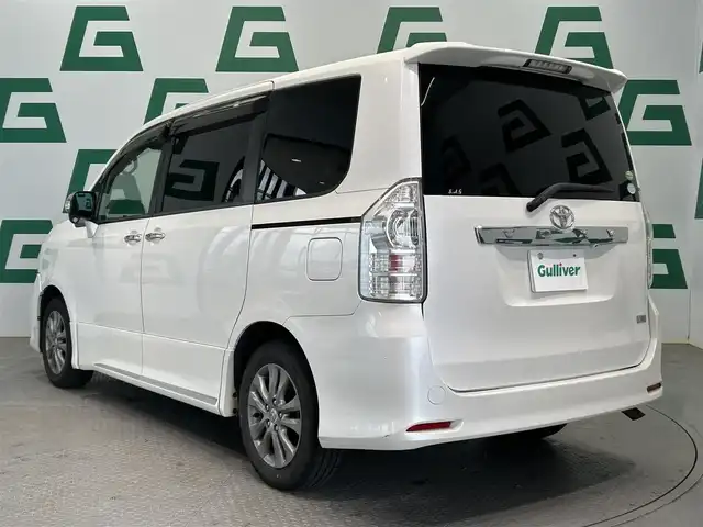 トヨタ ヴォクシー ZS 煌Z 鹿児島県 2013(平25)年 11.7万km ホワイトパールクリスタルシャイン アルパインナビ/(フルセグ/Bluetooth/DVD/CD)/前後ドライブレコーダー/後席モニター/バックカメラ/ＥＴＣ/両側パワースライドドア/純正アルミホイール/純正フロアマット/フロントフォグランプ/ドアバイザー/スマートキー/プッシュスタート