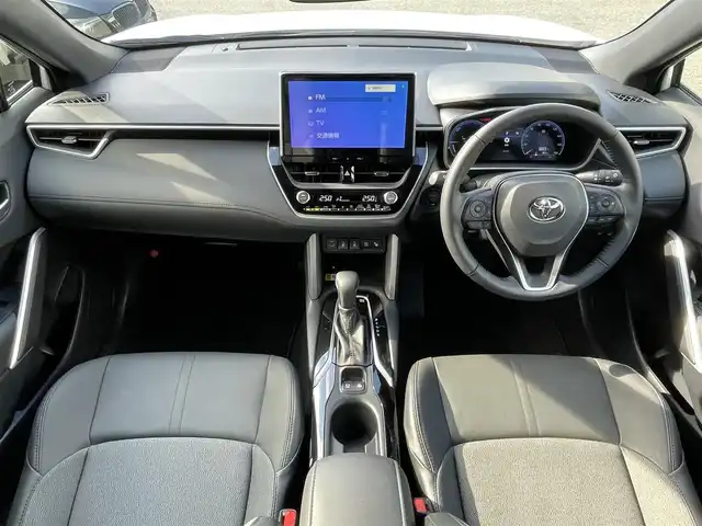 トヨタ カローラ クロス ハイブリッド Z 福岡県 2024(令6)年 0.1万km プラチナホワイトパールマイカ ワンオーナー/純正メーカーナビ/（Bluetooth対応/フルセグTV/AM/FM）/サンルーフ/レーダークルーズコントロール/ブラインドスポットモニター/360度カメラ/バックカメラ/前席シートヒーター/置くだけ充電/パワーバックドア/ルーフレール/ビルトインETC/純正フロアマット/純正アルミホイール/プッシュスタート/ハーフレザー/保証書/取扱説明書/スペアキー/スマートキー