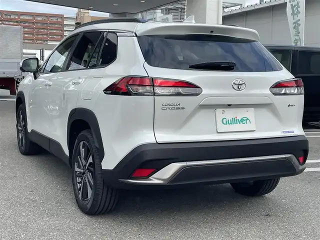 トヨタ カローラ クロス ハイブリッド Z 福岡県 2024(令6)年 0.1万km プラチナホワイトパールマイカ ワンオーナー/純正メーカーナビ/（Bluetooth対応/フルセグTV/AM/FM）/サンルーフ/レーダークルーズコントロール/ブラインドスポットモニター/360度カメラ/バックカメラ/前席シートヒーター/置くだけ充電/パワーバックドア/ルーフレール/ビルトインETC/純正フロアマット/純正アルミホイール/プッシュスタート/ハーフレザー/保証書/取扱説明書/スペアキー/スマートキー