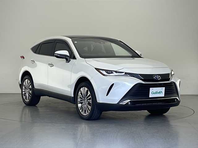 トヨタ ハリアー ハイブリッド Z 長野県 2024(令6)年 1.4万km プラチナホワイトパールマイカ 4WD/調光パノラマルーフ/寒冷地仕様/純正ナビ/（フルセグ/Bluetooth/USB/AM/FM)/全方位モニター/JBLサウンド/衝突軽減ブレーキ/車線逸脱防止/レーダークルーズコントロール/前後コーナーセンサー/ETC2.0/ブラインドスポットモニター/パワーバックドア/デジタルインナーミラー/D席パワーシート/前後ドライブレコーダー（TZ-PR210)/革巻きステアリング/取扱説明書
