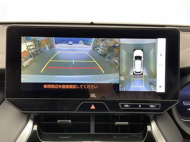 トヨタ ハリアー ハイブリッド Z 長野県 2024(令6)年 1.4万km プラチナホワイトパールマイカ 4WD/調光パノラマルーフ/寒冷地仕様/純正ナビ/（フルセグ/Bluetooth/USB/AM/FM)/全方位モニター/JBLサウンド/衝突軽減ブレーキ/車線逸脱防止/レーダークルーズコントロール/前後コーナーセンサー/ETC2.0/ブラインドスポットモニター/パワーバックドア/デジタルインナーミラー/D席パワーシート/前後ドライブレコーダー（TZ-PR210)/革巻きステアリング/取扱説明書