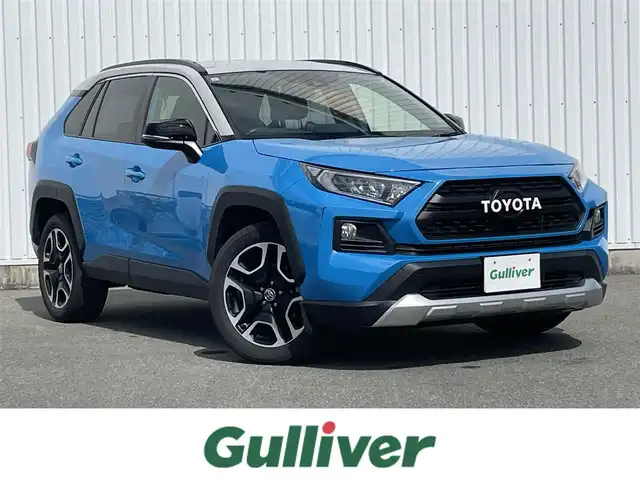 トヨタ ＲＡＶ４ アドベンチャー 福岡県 2019(令1)年 2.8万km アッシュグレーメタリック/シアンメタリック ルーフレール/黒革シート/純正ナビ（ＮＳＣＮ－Ｗ６８）/バックカメラ/衝突軽減/レーダークルーズコントロール/パワーシート/スマートキー/プッシュスタート/レーンアシスト/ＥＴＣ/純正１９インチアルミ