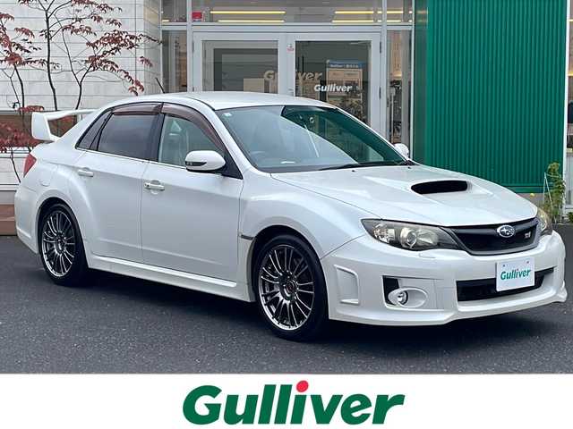 スバル インプレッサ ＷＲＸ STi 青森県 2011(平23)年 9.2万km サテンホワイトパール 4WD・ターボ/社外オーディオ/アルカンターラ/革コンビシート/運転席パワーシート/ETC/前後ドライブレコーダー/純正フロアマット/プッシュスタート/スマートキー/HIDヘッドライト/フォグランプ/OP BBS製純正18インチアルミ