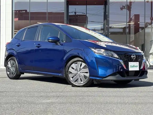 日産 ノート X 宮城県 2023(令5)年 7.3万km オーロラフレアブルーパール 登録時走行距離73008km/純正ナビ/ワンセグTV/HDMI/AM/FM/USB/Bluetooth/全方位カメラ/アラウンドビュー/プロパイロット/追従クルーズコントロール/プッシュスタート/スマートキー/ETC/純正フロアマット/コーナーセンサー/衝突軽減ブレーキ/ブラインドスポットモニター/置くだけ充電/純正ホイールカバー