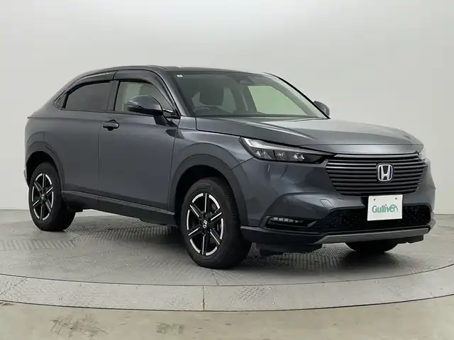 ホンダ ヴェゼル ハイブリッド e:HEV X 新潟県 2024(令6)年 8万km メテオロイドグレーメタリック 4WD/CMBS/純正SDナビ/　CD/DVD/Bluetooth/フルセグTV/バックカメラ/レーダークルーズコントロール/LEDヘッドライト/フォグランプ/シートヒーター/純正16インチアルミホイール/パドルシフト/チップアップシート/レーンキープアシスト/踏み間違い衝突軽減システム/前後ドラレコ/サイドミラーヒーター/電格ミラー/ウィンカーミラー/スマートキー/ビルトインETC