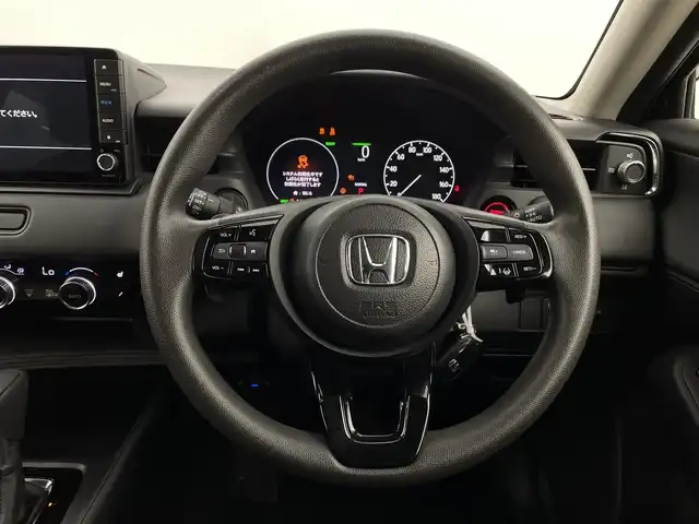 ホンダ ヴェゼル ハイブリッド e:HEV X 新潟県 2024(令6)年 8万km メテオロイドグレーメタリック 4WD/CMBS/純正SDナビ/　CD/DVD/Bluetooth/フルセグTV/バックカメラ/レーダークルーズコントロール/LEDヘッドライト/フォグランプ/シートヒーター/純正16インチアルミホイール/パドルシフト/チップアップシート/レーンキープアシスト/踏み間違い衝突軽減システム/前後ドラレコ/サイドミラーヒーター/電格ミラー/ウィンカーミラー/スマートキー/ビルトインETC