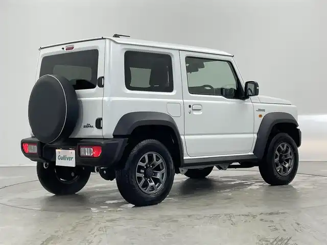 スズキ ジムニー シエラ JC 埼玉県 2023(令5)年 0.7万km ピュアホワイトP 社外９型ナビ　/ＭＴ車　/４ＷＤ　/スズキセーフティーサポート　/衝突軽減　/車線抑制　/ステアリングスイッチ　/ドライブレコーダー　/ＥＴＣ　/ＬＥＤヘッドライト　/フォグライト　/オートライト　/純正ＡＷ　