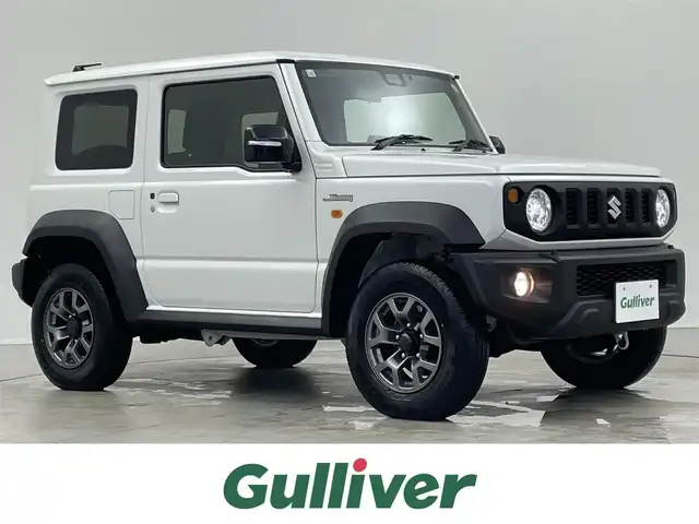 スズキ ジムニー シエラ JC 埼玉県 2023(令5)年 0.7万km ピュアホワイトP 社外９型ナビ　/ＭＴ車　/４ＷＤ　/スズキセーフティーサポート　/衝突軽減　/車線抑制　/ステアリングスイッチ　/ドライブレコーダー　/ＥＴＣ　/ＬＥＤヘッドライト　/フォグライト　/オートライト　/純正ＡＷ　